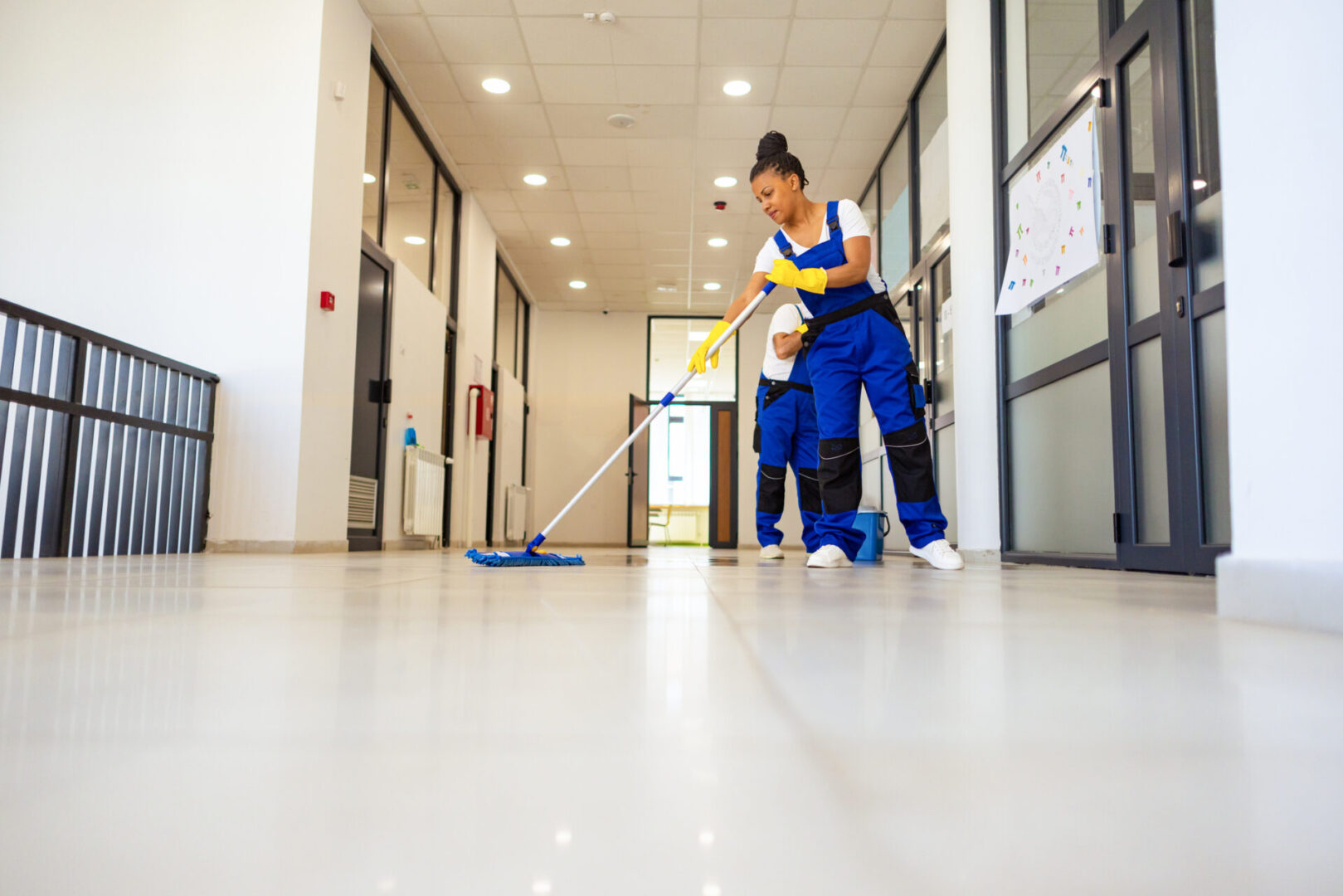 Cleaning staff maintaining building hygiene